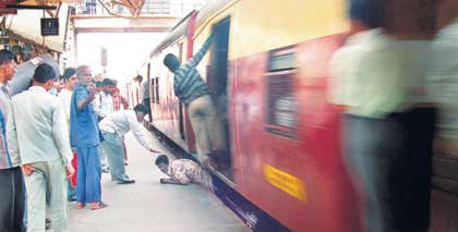 A man slipped and fell in the gap between the train and the platform at Kandivli station