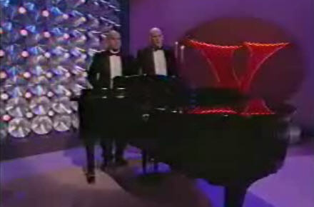 The piano brothers playing piano without hands